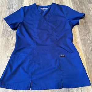 Greys Anatomy by Barco Scrub Top. Great Quality.
Size Small Royal Blue